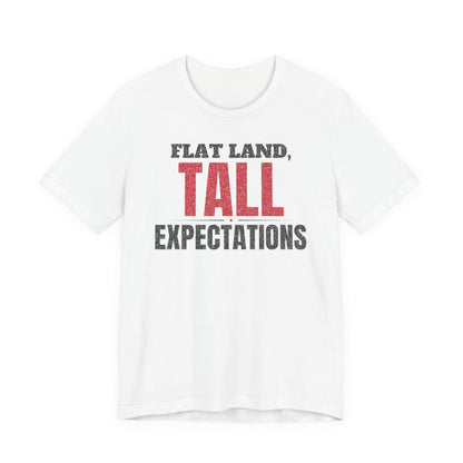 White graphic T-shirt with 'FLAT LAND, TALL EXPECTATIONS' front print