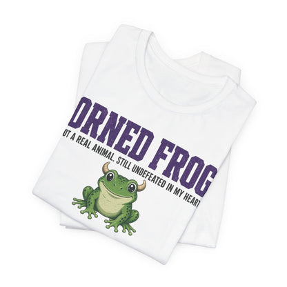 White graphic t-shirt with large purple 'Horned Frogs' lettering and green frog