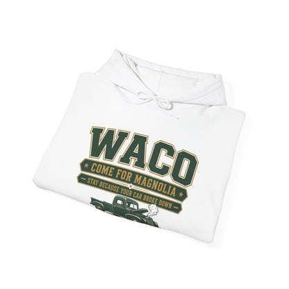 White hoodie folded with large WACO graphic on chest