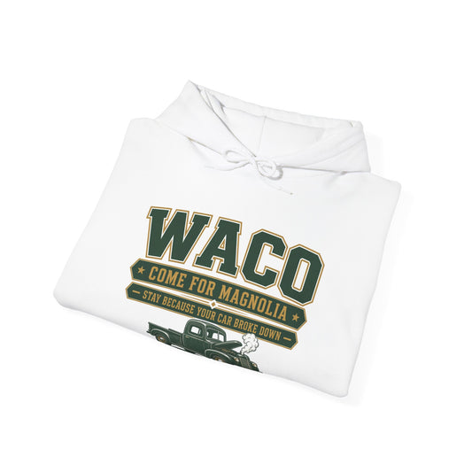 White hoodie folded with large WACO graphic on chest