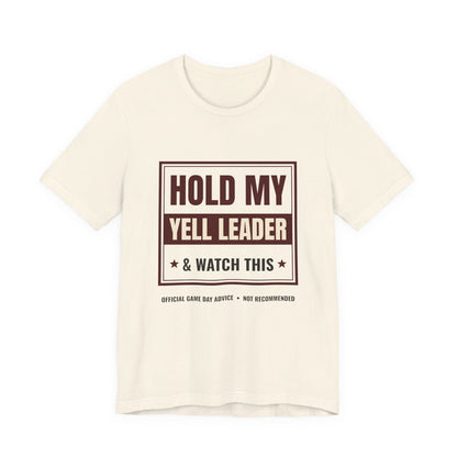 Natural crewneck graphic tee with "HOLD MY YELL LEADER" front print