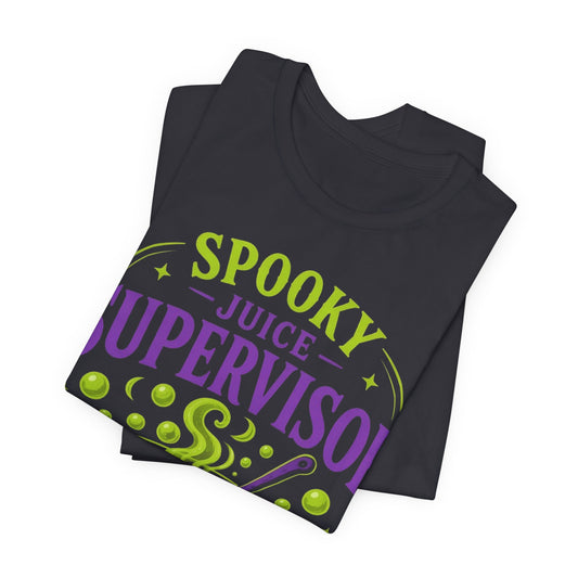 Dark grey folded crewneck T-shirt with neon cauldron Spooky Juice Supervisor print