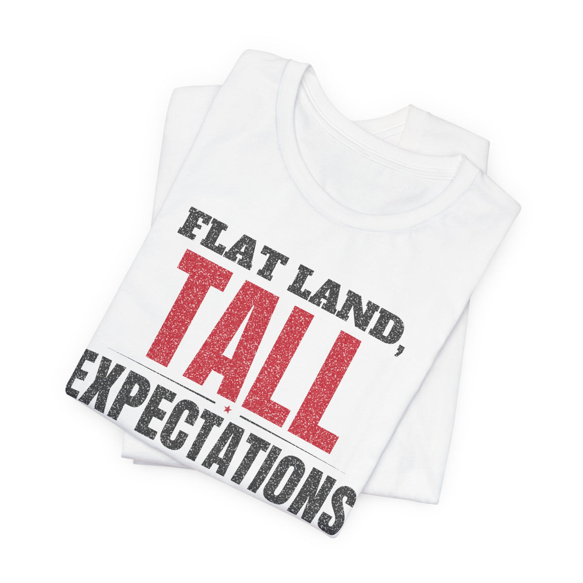 White graphic T-shirt with 'FLAT LAND, TALL EXPECTATIONS' lettering front