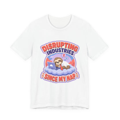 White graphic T-shirt with “DISRUPTING INDUSTRIES” and bear sleeping in clouds
