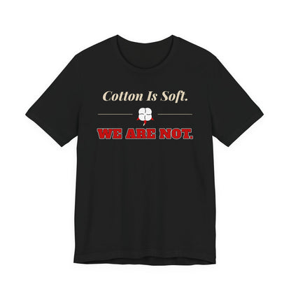 Black cotton T-shirt with gold-and-red chest text and small fist icon graphic