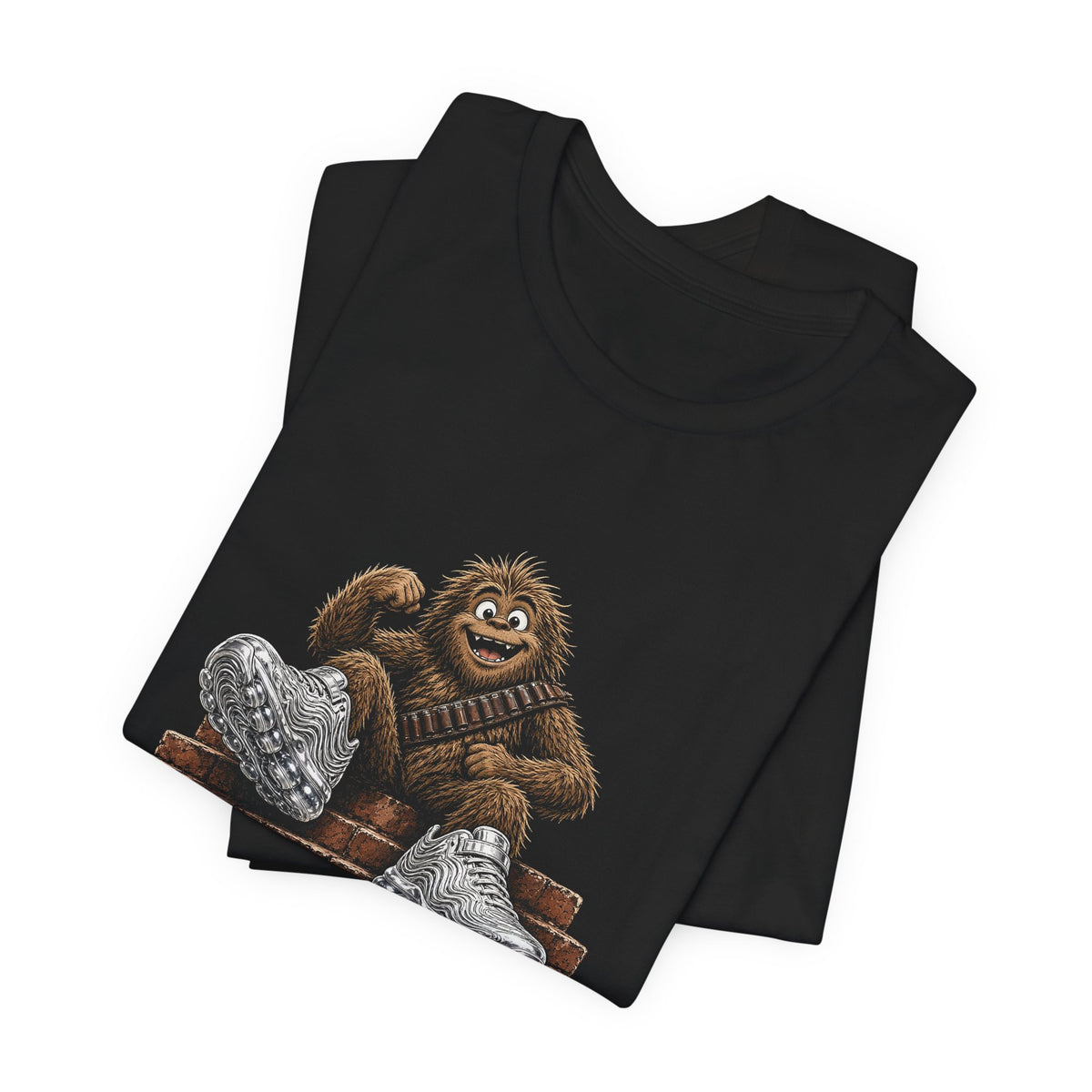 Black t-shirt stack with ape holding a heart graphic and silver shoe detail