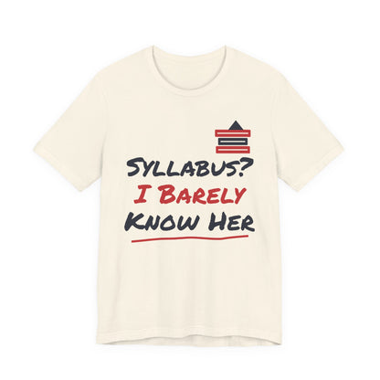 Cream t-shirt with “Syllabus? I Barely Know Her” graphic and red book icon