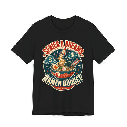 Black crewneck graphic tee with colorful "SERIES A DREAMS" "RAMEN BUDGET" ramen bowl print