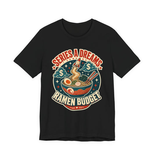 Black crewneck graphic tee with colorful "SERIES A DREAMS" "RAMEN BUDGET" ramen bowl print