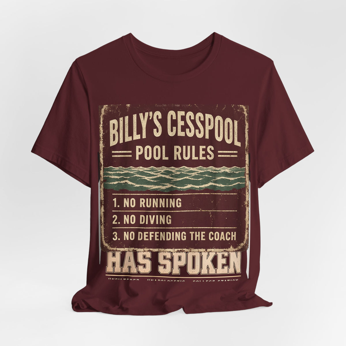 Maroon crewneck t-shirt with centered “Billy’s Cesspool—Pool Rules” graphic and “Has Spoken”
