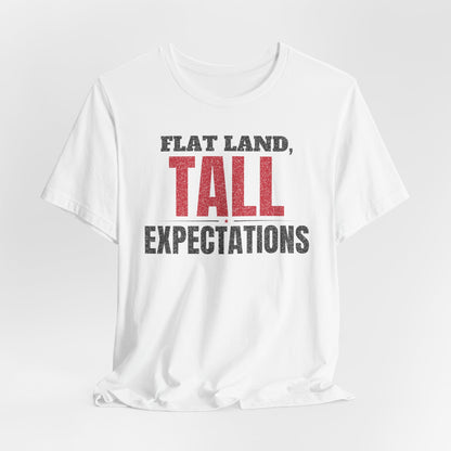 White crewneck T-shirt with 'FLAT LAND, TALL EXPECTATIONS' front graphic