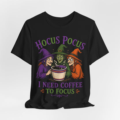 Black crewneck tee with 'Hocus Pocus' headline, witches, and 'I need coffee to focus'