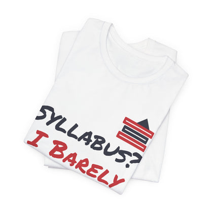 White t-shirt stacked close-up showing “SYLLABUS? I BARELY” text and book graphic