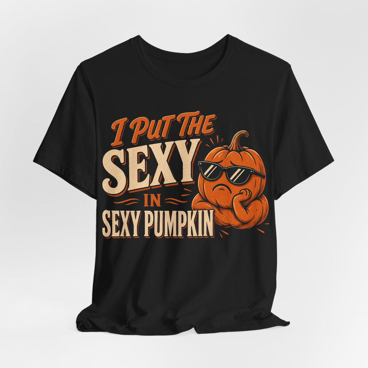 Black crewneck T-shirt with orange pumpkin, sunglasses, and sexy pumpkin text print