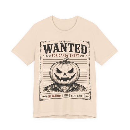 Soft cream tee with black “WANTED” jack-o-lantern graphic