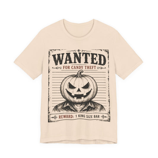 Soft cream tee with black “WANTED” jack-o-lantern graphic