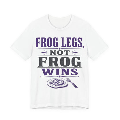 White tee with purple/black "FROG LEGS, NOT FROG WINS" graphic
