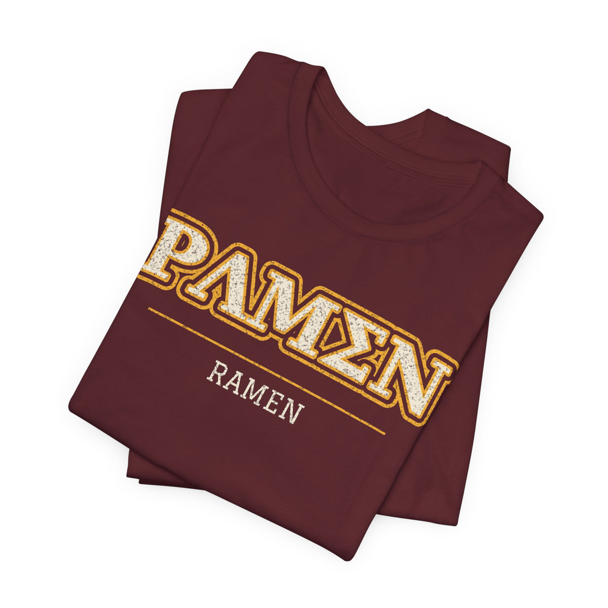 Maroon folded T-shirt with vintage-style 'RAMEN' graphic