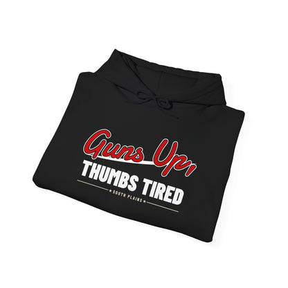 Folded black pullover hoodie with drawstring hood and kangaroo pocket, “Guns Up, Thumbs Tired” print