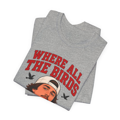 Athletic heather gray crewneck graphic tee, folded, with illustrated man and red 'WHERE ALL THE BIRDS' print.