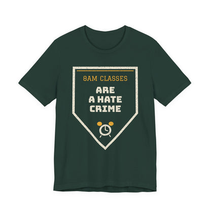 Forest green graphic T-shirt with '8AM CLASSES' hate crime emblem