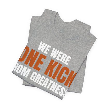 Heather gray graphic T-shirt, angled view, multicolor 'WE WERE ONE KICK' print