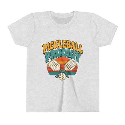 Kids heather gray pickleball tee with colorful "Pickleball Prodigy" graphic and paddles