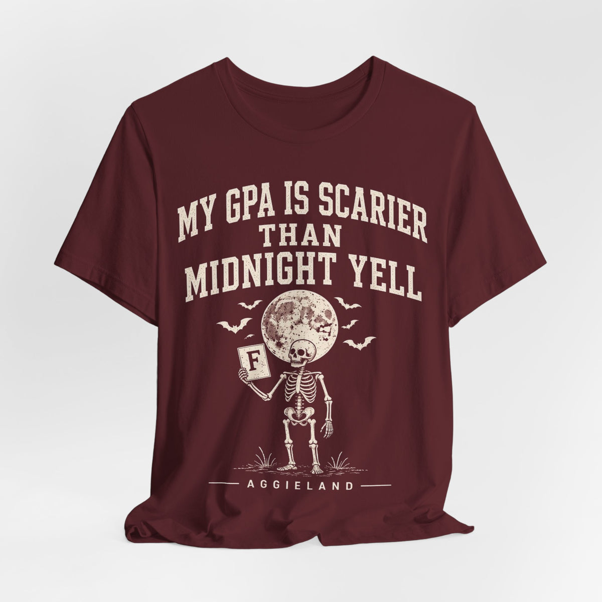 Maroon graphic T-shirt with “My GPA is scarier than midnight yell” full front print