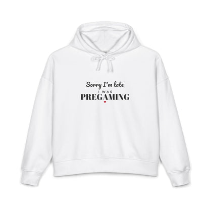White women's hoodie with hood drawstrings and front text graphic 'Pregaming'.