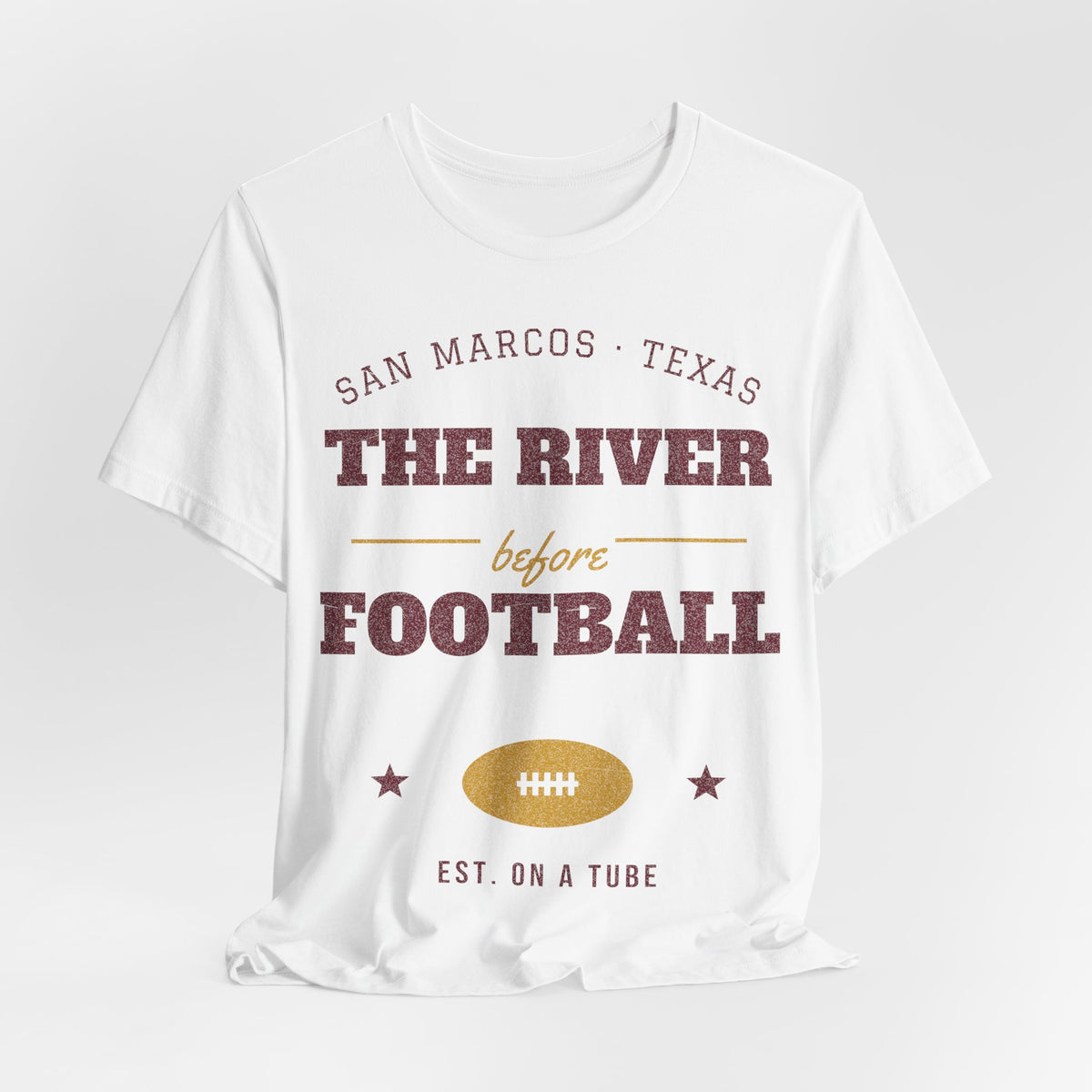 White football graphic T-shirt with maroon 'EST. ON A TUBE' and star accents