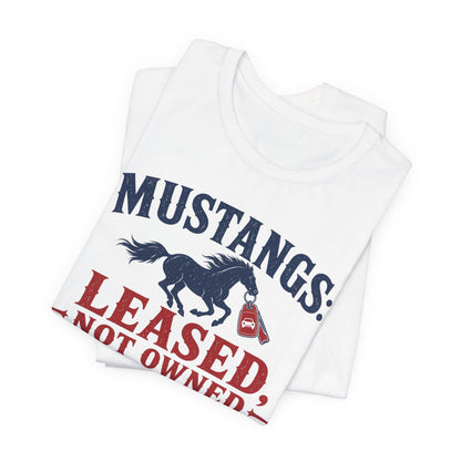 White tee with large diagonal 'MUSTANGS: LEASED, NOT OWNED' print