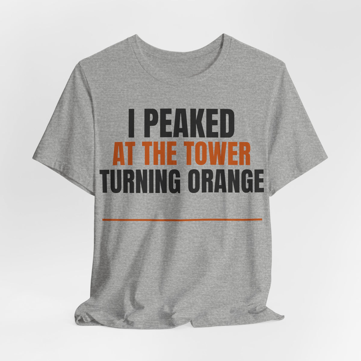 Heather gray crewneck T-shirt with orange and black 'I PEAKED AT THE TOWER TURNING ORANGE' print.