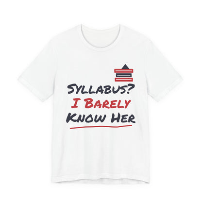 White t-shirt with multicolor “Syllabus? I Barely Know Her” graphic and book icon