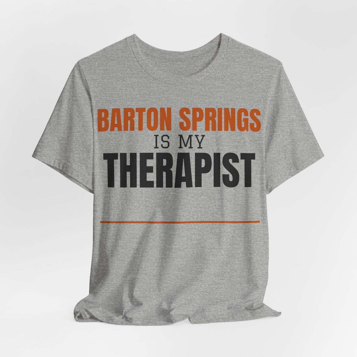 Heather gray crew-neck T-shirt with orange 'Barton Springs' and black 'Therapist' text