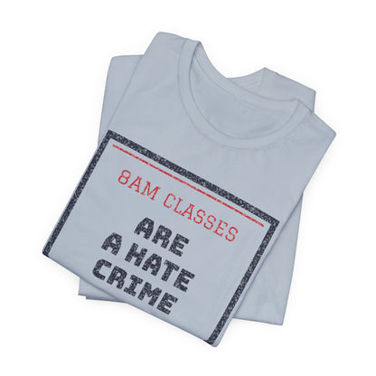 Light blue short-sleeve crewneck T-shirt with bold front text graphic